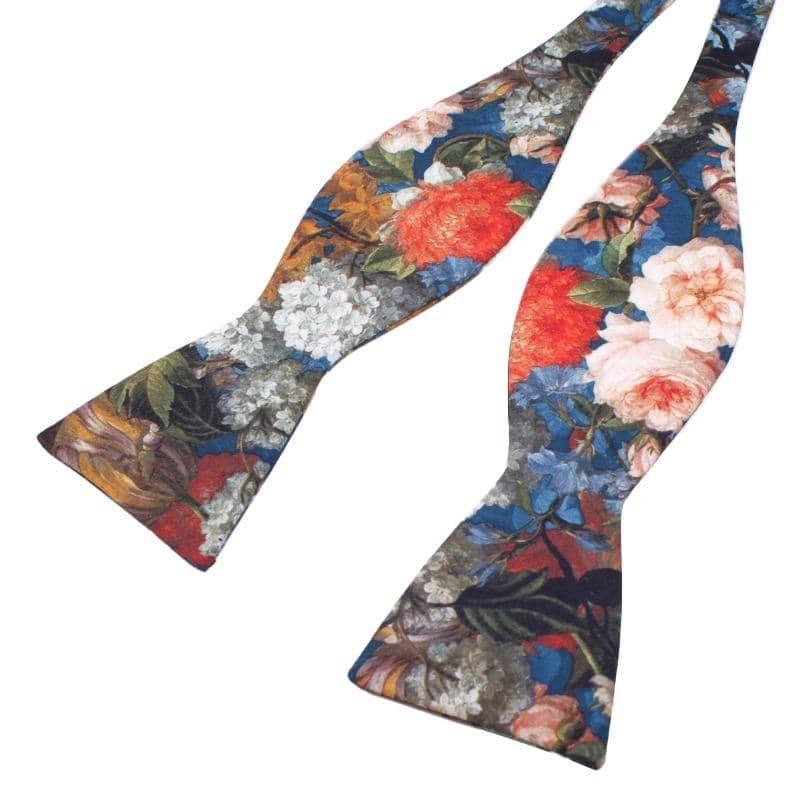 Blue Floral Bow Tie Self Tie HAMILTON by MYTIESHOP-Blue Floral Bow Tie Hamilton Self tie 100% Cotton Flannel Handmade Adjustable to fit most neck sizes 13 3/4" - 20" Looking for the perfect addition to your professional wardrobe? Check out this CORA Pink Skinny Tie 2.36". Made from high-quality materials, this tie is perfect for the office or any formal occasion. The slim design ensures a sharp look, while the pink color adds a touch of fun and personality. Whether you're dressing up for an impo