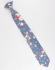 Boys Floral Clip On Tie 2.3" NEIL-Boys Floral Clip On Tie Material:Cotton Blend Approx Size: Max width: 6.5 cm / 2.4 inches 9-24 months 26 CM2-5 years 31 CM9-11 Years 43 CM Get your little man looking sharp with this blue floral print tie. This dapper clip-on tie is perfect for any formal occasion, from weddings to christenings. The blue floral print is just the right amount of dainty, and the fit is tailored to fit boys of all ages. With a versatile style that can be dressed up or down, this ti