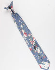 Boys Floral Clip On Tie 2.3" NEIL-Boys Floral Clip On Tie Material:Cotton Blend Approx Size: Max width: 6.5 cm / 2.4 inches 9-24 months 26 CM2-5 years 31 CM9-11 Years 43 CM Get your little man looking sharp with this blue floral print tie. This dapper clip-on tie is perfect for any formal occasion, from weddings to christenings. The blue floral print is just the right amount of dainty, and the fit is tailored to fit boys of all ages. With a versatile style that can be dressed up or down, this ti