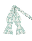 COOPER Self Tie Bow Tie-Green Floral Bow Tie self tie 100% Cotton Flannel Color: Green Adjustable to fit most neck sizes 13 3/4" - 18" Up your style game with this COOPER Self Tie Bow Tie. This bow tie is perfect for adding a touch of personality and flair to your outfit. Whether you're dressing up for a wedding or just want to add a pop of color, this bow tie is perfect for any occasion. The self-tie design means you can adjust it to get the perfect fit every time. The blue floral print is perf