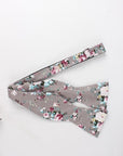 Gray Floral Bow Tie Self Tie Taupe SANDY Mytieshop-Gray Floral Bow Tie Self Tie 100% Cotton Flannel Handmade Adjustable to fit most neck sizes 13 3/4" - 18" Color: Mauve Sandy Bow tie for men. Mauve bow tie for men. White green blue and burgundy flowers. Spring has sprung with this dashing SANDY Mauve Self Tie Bow Tie. A light pink, green and blue tie for a modern gentleman. This tie is perfect for any season, with a versatile color palette that pops. Whether you wear it to your next wedding or 
