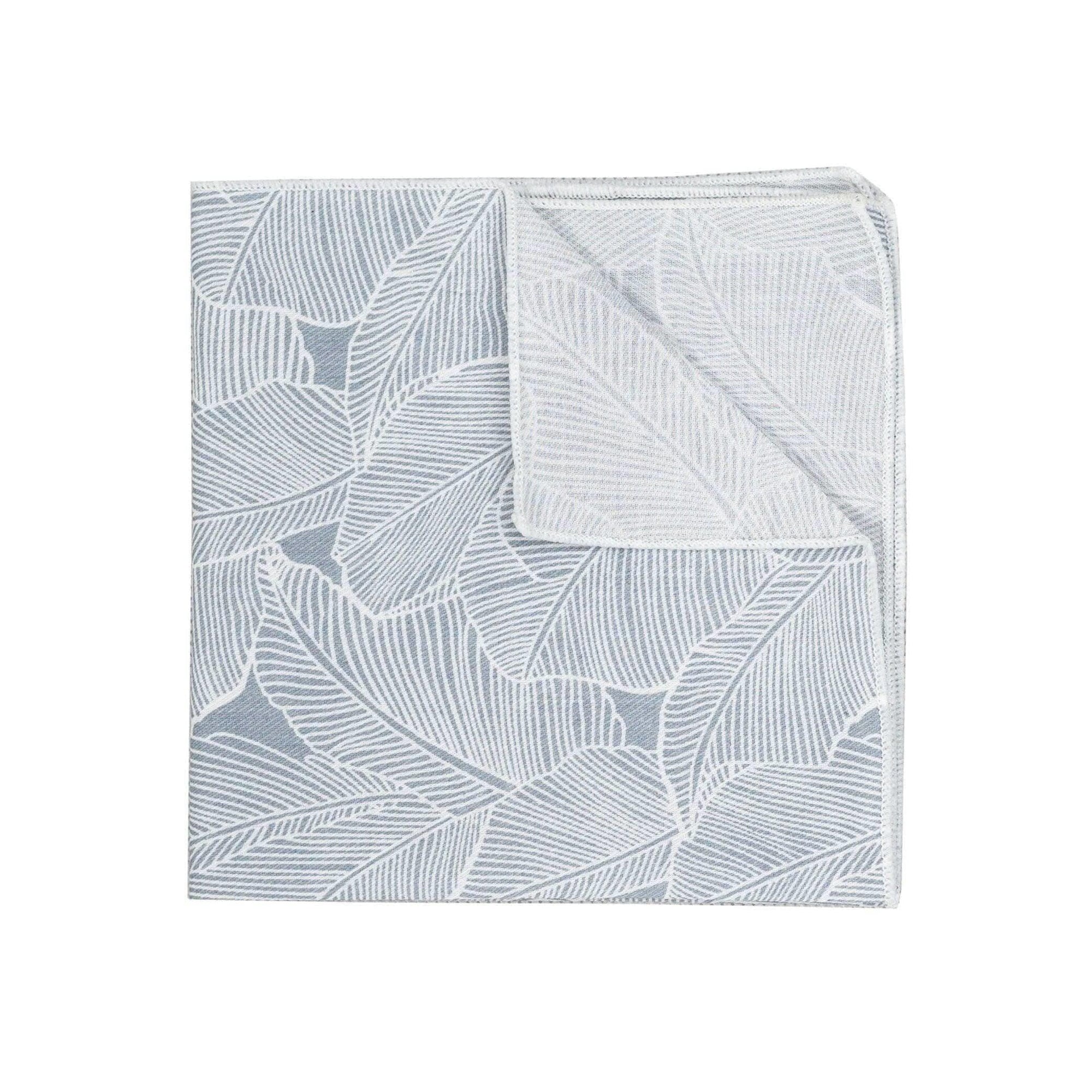 Gray Floral Pocket Square EZRA - MYTIESHOP Mytieshop Gray Floral Pocket Square Material CottonItem Length: 23 cm ( 9 inches)Item Width : 22 cm (8.6 inches) Color: Gray / Grey Great for: Groom Groomsmen Wedding Shoots Formal Prom Fancy Parties Gifts and presents A dashing addition to any outfit. Inspired by the changing leaves of fall, this pocket square is the perfect finishing touch to your look. With a versatile gray color and a modern floral print, it's perfect for any occasion. Whether you'r