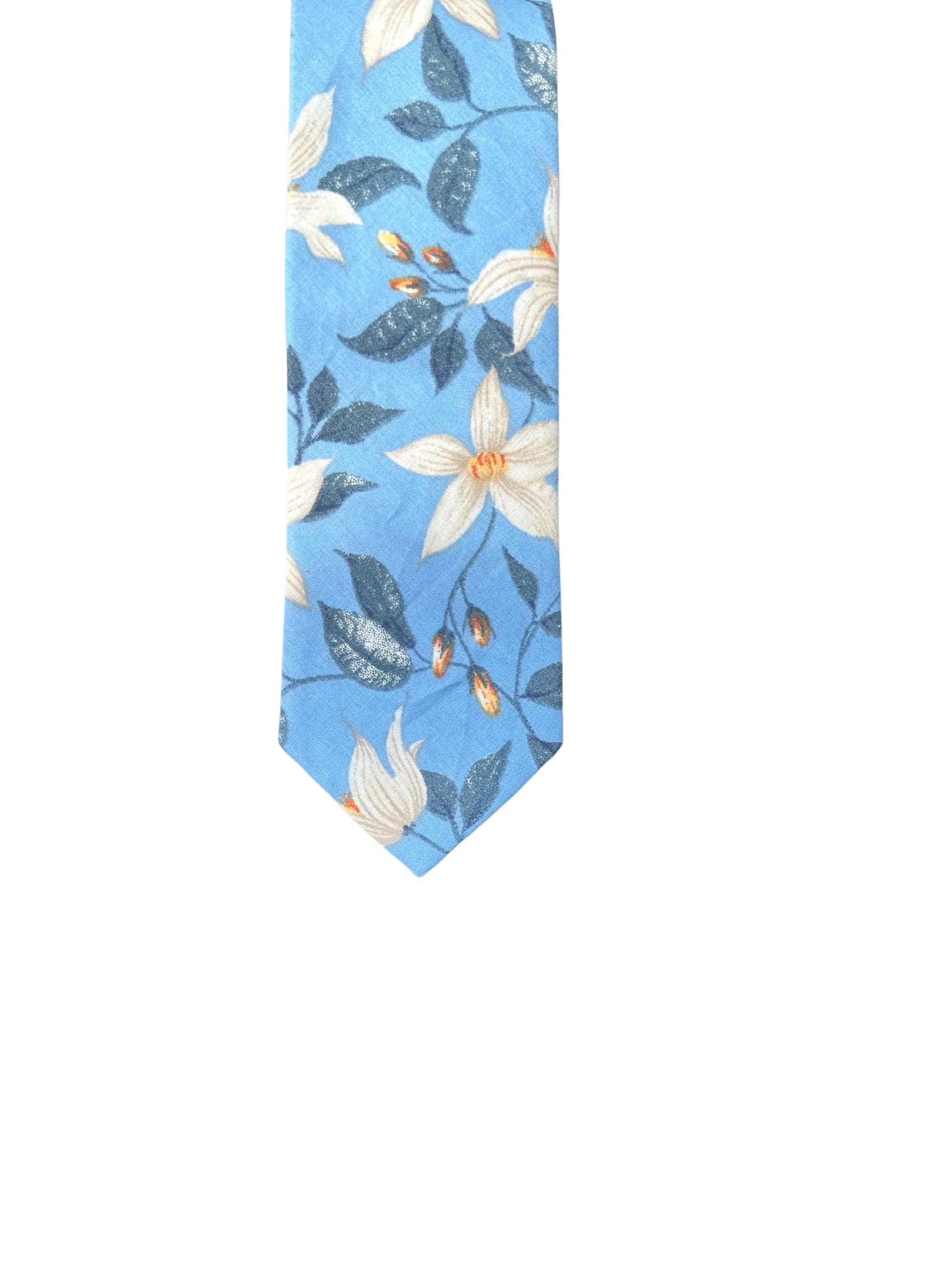Blue Floral Tie Skinny with Flowers  Add a pop of personality to any formal outfit with this beige floral skinny tie. Made from high-quality materials, this tie is perfect for groomsmen, weddings, or any other formal occasion. The skinny design ensures a sleek and polished look, while the beige color and floral pattern add a touch of fun and flair. mytieshop