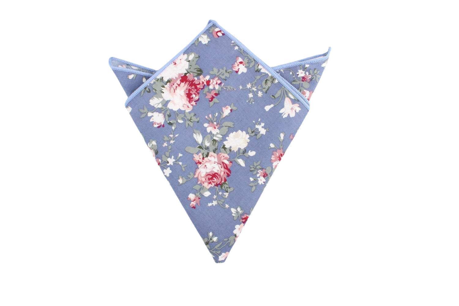 NEIL Blue Floral pocket square Mytieshop Blue floral pocket square Color: BlueItem Length: 23 cm ( 9 inches)Item Width : 22 cm (8.6 inches) A dashing finishing touch for any formal outfit. This NEIL Blue Floral pocket square is the perfect way to add a touch of color and elegance to any outfit. Whether you're dressing up for a special occasion or just want to add a touch of sophistication to your everyday style, this handkerchief is a must-have. It also makes the perfect gift for the dapper man 