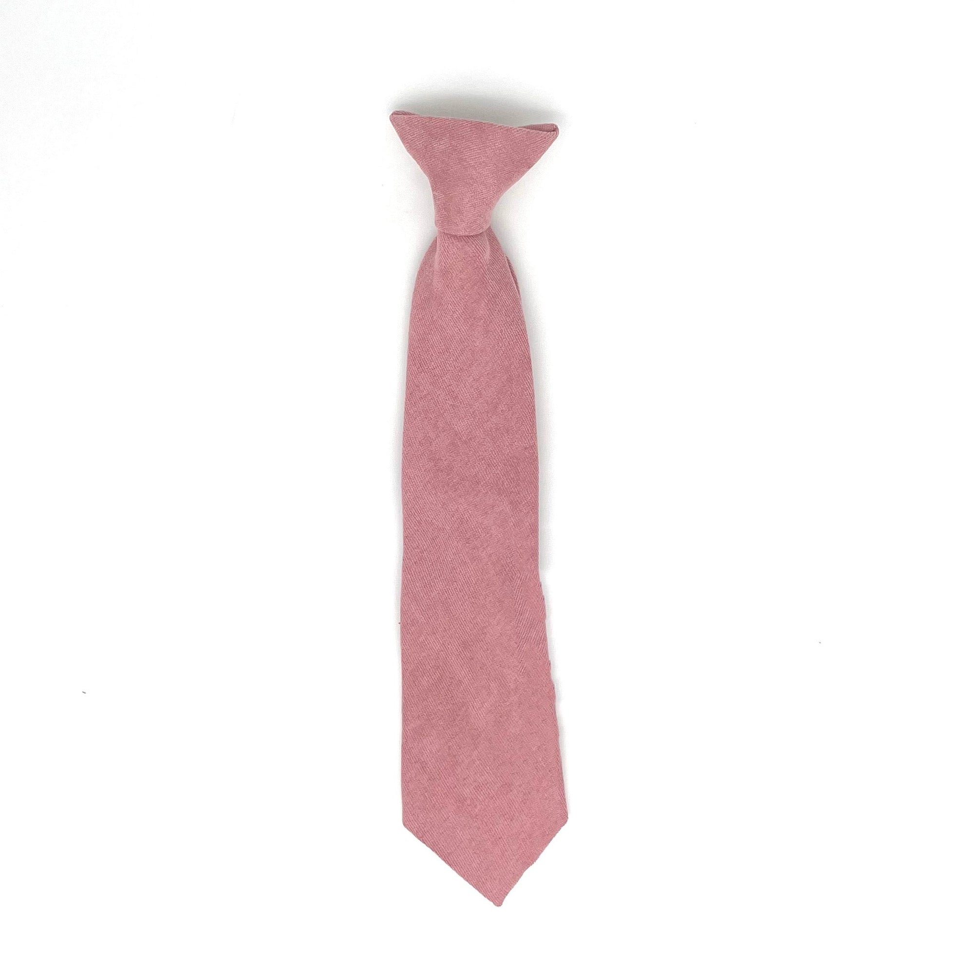 Pink Boys Floral Clip On Tie 2.36 Mytieshop - ROSÉ-Pink Boys Floral Clip On Tie Material: Suede Approx Size: Color: Pink Max width: 6.5 cm / 2.4 inches Available sizes: 9-24 months 26 CM 2-5 years 31 CM 9-11 Years 43 CM Great for Prom Dinners Interviews Photo shoots Photo sessions Dates Wedding Attendant Ring Bearers Kids clip on tie. Fits boys and kids. bow tie floral for wedding and events groom groomsmen flower bow tie mytieshop ring bearer page boy bow tie white bow tie white and blue tie ki