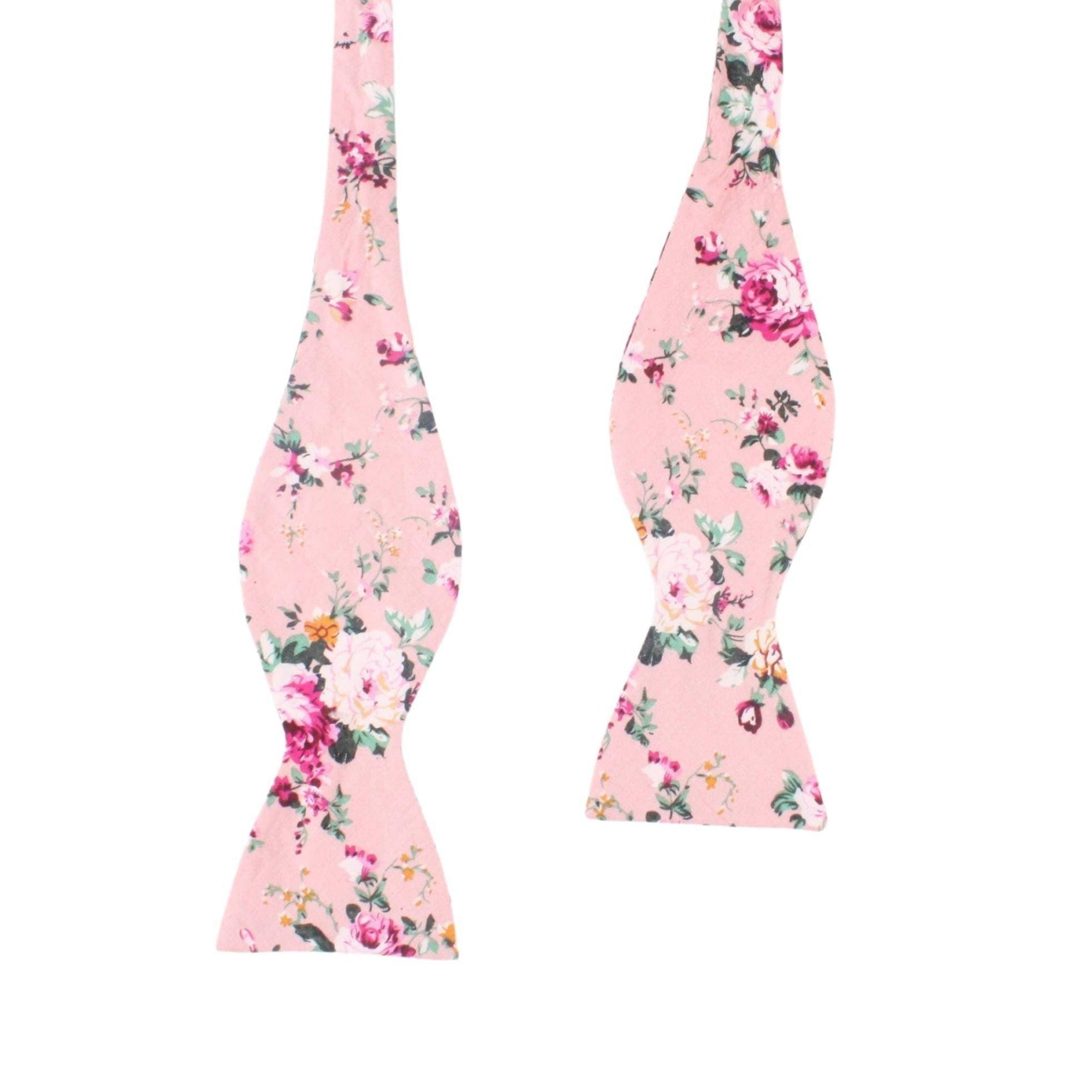 Pink Floral Bow Tie Self Tie MILLIE MYTIESHOP-You&#39;ll be the best dressed groom and groomsmen with this pink salmon bow tie. A must-have for the groomsmen, this pink salmon bow tie is perfect for any formal occasion. With its light pink and green floral print, this bow tie is sure to add personality to any outfit. Get ready to tie the knot in style with this self-tie bow tie.-Mytieshop