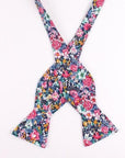 Pink Floral Bow Tie Self Tie ROBERT - MYTIESHOP | Pink-Pink Bow Tie for men 100% Cotton Flannel Handmade Adjustable to fit most neck sizes 13 3/4" - 18" Base is WHITE A dashing addition to any formalwear. Whether you're dressing up for a special event or want to add a touch of personality to your workwear, this printed bow tie is a great way to go. With a versatile and colorful floral print, it's perfect for any formal occasion. Tie it on and feel confident and stylish.-Mytieshop