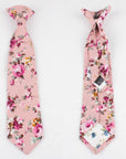 Pink Floral tie for Boys Floral Clip On Tie 2.3 MILLIE-Material:Cotton Blend Approx Size: Max width: 6.5 cm / 2.4 inches 9-24 months 26 CM2-5 years 31 CM9-11 Years 43 CM Add some spunk to your little one's wardrobe with this MILLIE Boys Floral Clip On Tie. This tie is made for boys and is a skinny tie with a floral pattern. It's the perfect way to add a pop of color and personality to any outfit. Whether your little guy is dressing up for a wedding or a special family dinner, he's sure to make a