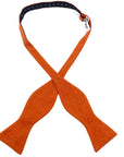 Rust Orange Bow Tie Self Tie SAFFRON MYTIESHOP-Rust Orange Bow Tie 100% Suede Handmade Adjustable to fit most neck sizes 13 3/4" - 18" Make a dapper statement at your next formal event with this rust orange bow tie. Handcrafted from premium suede, this bow tie has a luxurious feel that will have you looking and feeling your best. The perfect accessory for fall weddings, this bow tie will add a touch of sophistication to your outfit. Whether you're the groom or a member of the wedding party, this