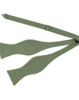 SAGE GREEN Men’s Self Tie Bow Tie-Sage green bow tie self tie 100% Cotton Flannel Handmade Adjustable to fit most neck sizes 13 3/4" - 18" Color: Green A dapper addition to any formal outfit. Our sage green self tie bow tie is the perfect way to add a touch of color to your outfit. With its stylish design and versatile color, it can be worn with a variety of different outfits. Whether you're gearing up for a formal event or just need a new bow tie for everyday wear, this is the perfect accessor