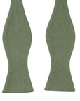 SAGE GREEN Men’s Self Tie Bow Tie-Sage green bow tie self tie 100% Cotton Flannel Handmade Adjustable to fit most neck sizes 13 3/4" - 18" Color: Green A dapper addition to any formal outfit. Our sage green self tie bow tie is the perfect way to add a touch of color to your outfit. With its stylish design and versatile color, it can be worn with a variety of different outfits. Whether you're gearing up for a formal event or just need a new bow tie for everyday wear, this is the perfect accessor