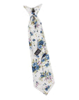 White Boys Floral Clip On Tie 2.3 Mytieshop - SAGE White-Material:Cotton Blend Approx Size: Max width: 6.5 cm / 2.4 inches 9-24 months 26 CM2-5 years 31 CM9-11 Years 43 CM Give your little man a dapper touch with this SAGE Boys Floral Clip On Tie. Ideal for weddings, special occasions or just a day out in town, this boys clip on tie is perfect for giving your child that polished look. With its vibrant floral print, he'll be sure to turn heads. Whether he's wearing it with a suit or with a more c