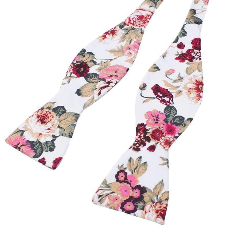 White Floral Bow Tie Self Tie IADA-White Floral Bow Tie Self Tie 100% Cotton Flannel Handmade Adjustable to fit most neck sizes 13 3/4" - 18" Color: White White floral Self tie Bow tie with pink, burgundy, red and green flowers. Great for the groom and groomsmen to wear for the weddings. Floral Self tie bow tie for weddings and events. Great anniversary present and gift. Also great gift for the groom and his groomsmen to wear at the wedding. Great for Prom Dinners Interviews Photo shoots Photo s