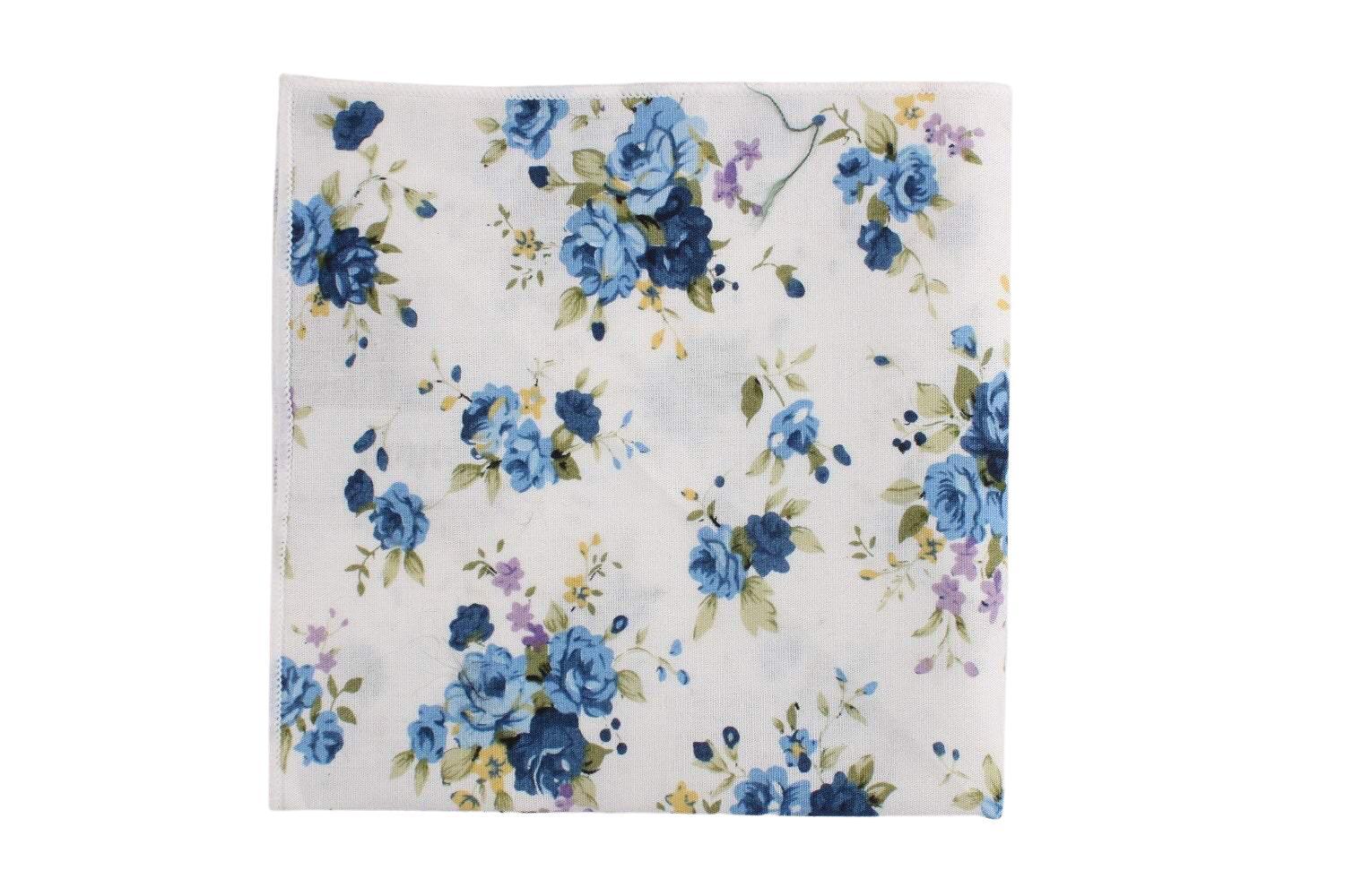 White Floral Pocket Square Mytieshop - SAGE Mytieshop White Floral Pocket SquareMaterial CottonItem Length: 23 cm ( 9 inches)Item Width : 22 cm (8.6 inches) The epitome of sophisticated style, this white floral pocket square is perfect for that sharp dressed man. Whether you're accessorizing for a wedding, a formal event, or just for work, this pocket square is sure to elevate your look. The delicate florals are understated and elegant, and the pocket square itself is made of high-quality fabric
