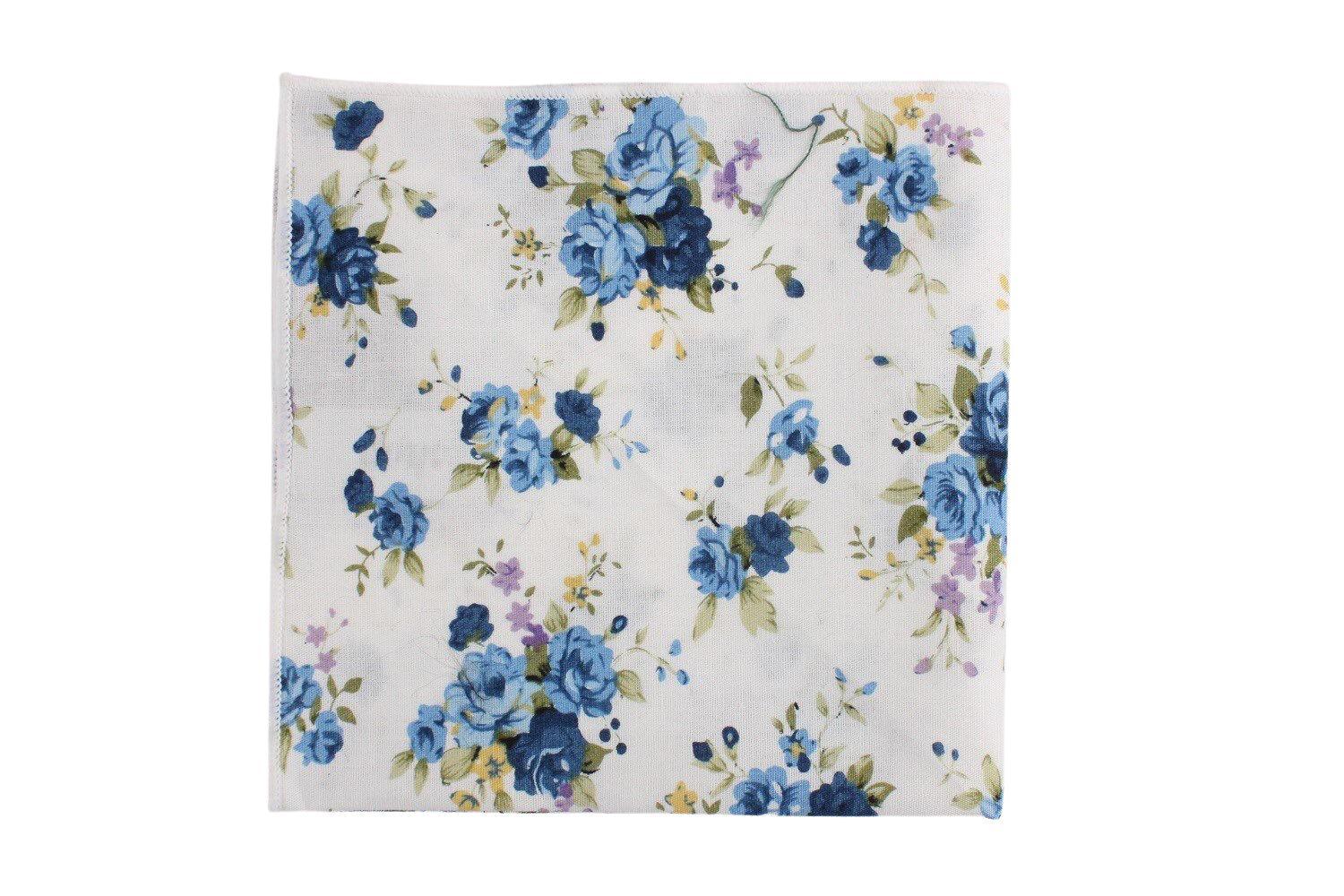 White Floral Pocket Square Mytieshop - SAGE Mytieshop White Floral Pocket SquareMaterial CottonItem Length: 23 cm ( 9 inches)Item Width : 22 cm (8.6 inches) The epitome of sophisticated style, this white floral pocket square is perfect for that sharp dressed man. Whether you're accessorizing for a wedding, a formal event, or just for work, this pocket square is sure to elevate your look. The delicate florals are understated and elegant, and the pocket square itself is made of high-quality fabric