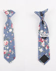 Boys Floral Clip On Tie 2.3" NEIL-Boys Floral Clip On Tie Material:Cotton Blend Approx Size: Max width: 6.5 cm / 2.4 inches 9-24 months 26 CM2-5 years 31 CM9-11 Years 43 CM Get your little man looking sharp with this blue floral print tie. This dapper clip-on tie is perfect for any formal occasion, from weddings to christenings. The blue floral print is just the right amount of dainty, and the fit is tailored to fit boys of all ages. With a versatile style that can be dressed up or down, this ti