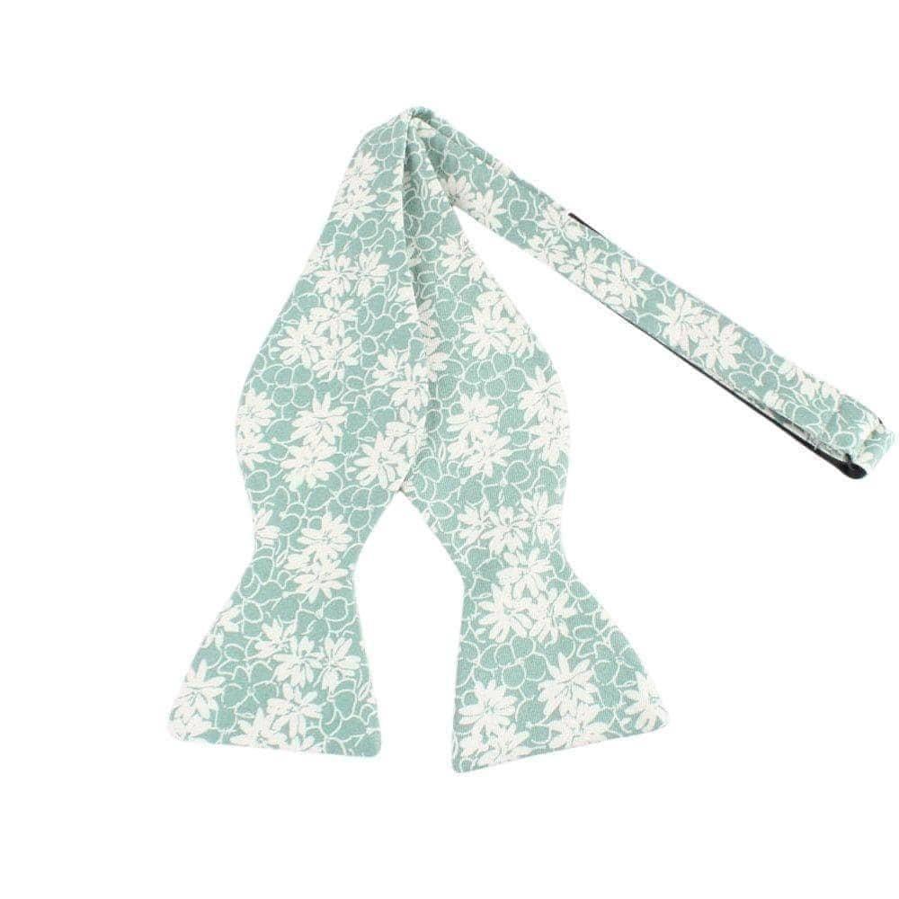 COOPER Self Tie Bow Tie-Green Floral Bow Tie self tie 100% Cotton Flannel Color: Green Adjustable to fit most neck sizes 13 3/4" - 18" Up your style game with this COOPER Self Tie Bow Tie. This bow tie is perfect for adding a touch of personality and flair to your outfit. Whether you're dressing up for a wedding or just want to add a pop of color, this bow tie is perfect for any occasion. The self-tie design means you can adjust it to get the perfect fit every time. The blue floral print is perf
