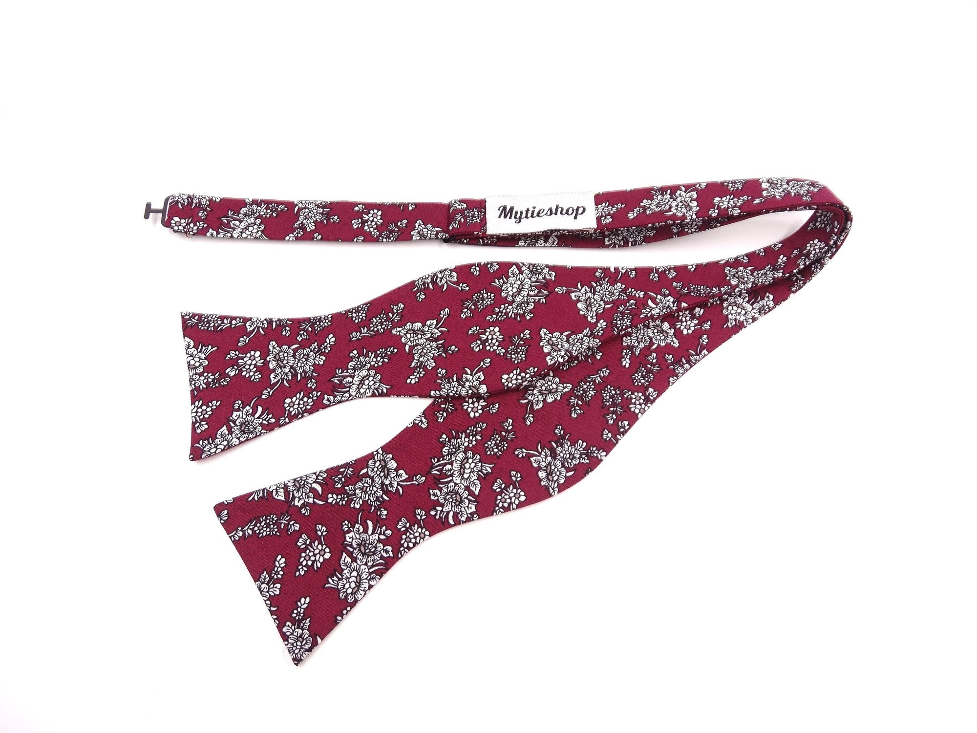 Maroon Floral Bow Tie Self Tie MYTIESHOP PRESTON-Maroon Floral Bow Tie Self Tie 100% Cotton Flannel Handmade Adjustable to fit most neck sizes 13 3/4&quot; - 18&quot; Color: Burgundy Great for Prom Dinners Interviews Photo shoots Photo sessions Dates Groom to stand out between his Groomsmen pair them up with neckties while he wears the bow tie. Floral self tie bow tie for weddings and events. Great anniversary present and gift. Also great gift for the groom and his groomsmen to wear at the wedding, and do