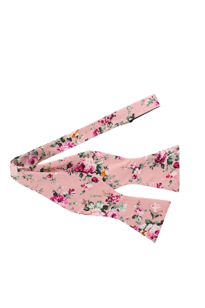 Pink Floral Bow Tie Self Tie MILLIE MYTIESHOP-You&#39;ll be the best dressed groom and groomsmen with this pink salmon bow tie. A must-have for the groomsmen, this pink salmon bow tie is perfect for any formal occasion. With its light pink and green floral print, this bow tie is sure to add personality to any outfit. Get ready to tie the knot in style with this self-tie bow tie.-Mytieshop