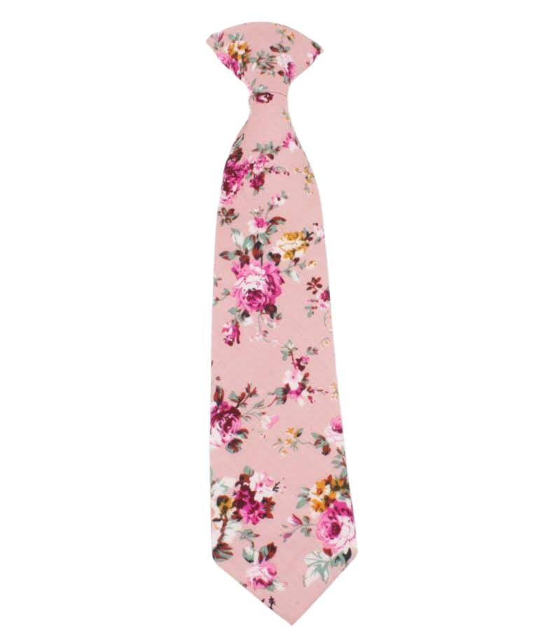 Pink Floral tie for Boys Floral Clip On Tie 2.3 MILLIE-Material:Cotton Blend Approx Size: Max width: 6.5 cm / 2.4 inches 9-24 months 26 CM2-5 years 31 CM9-11 Years 43 CM Add some spunk to your little one&#39;s wardrobe with this MILLIE Boys Floral Clip On Tie. This tie is made for boys and is a skinny tie with a floral pattern. It&#39;s the perfect way to add a pop of color and personality to any outfit. Whether your little guy is dressing up for a wedding or a special family dinner, he&#39;s sure to make a