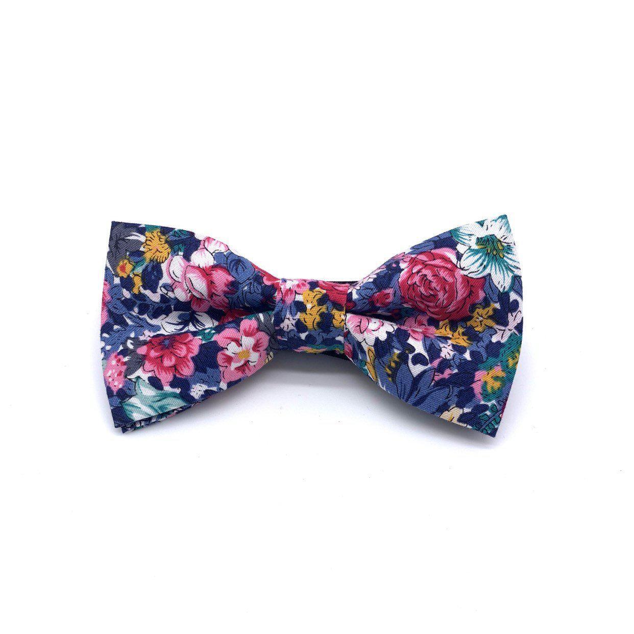 Pink Kids Floral Pre-Tied Bow Tie (ROBERT)-Make dressing up a breeze with our pre-tied bow tie. This dapper bow tie is perfect for any special occasion. With a sweet floral print and a playful green color, it&#39;s sure to add a touch of fun to your little one&#39;s outfit. With an adjustable neckband and easy-to-use clip closure, our bow tie is a breeze to put on and take off. So whether it&#39;s for a party or just for everyday wear, your child is sure to love our ROBERT tie. Strap is adjustablePre-Tied b
