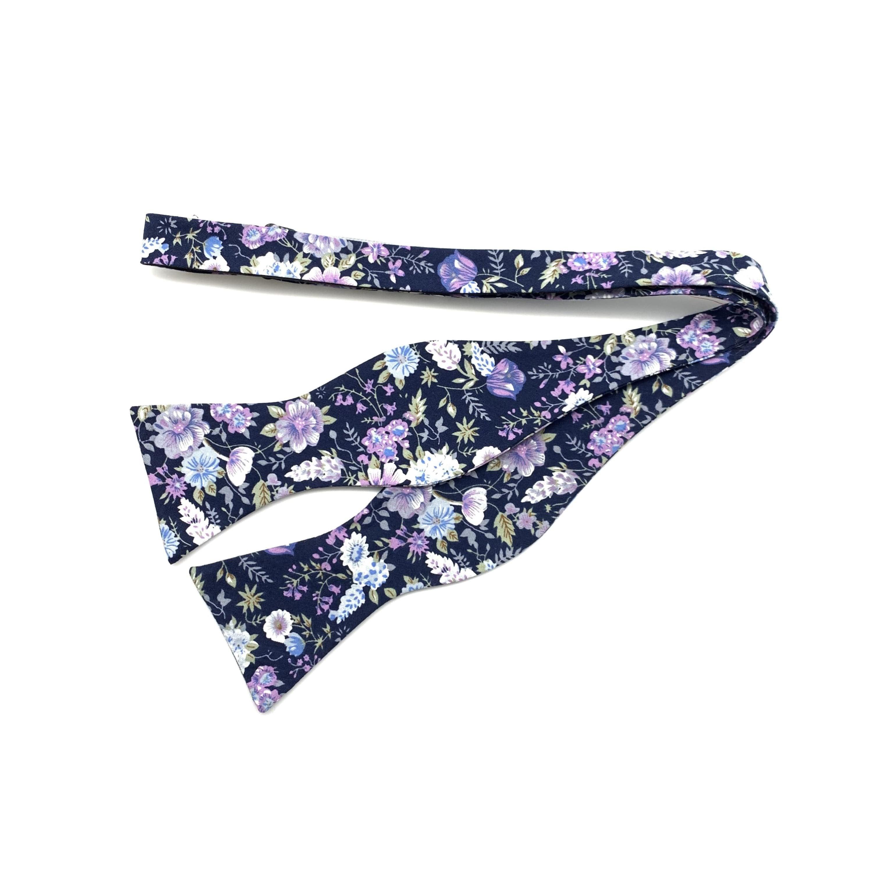 Purple Floral Bow Tie Self Tie Bow Tie Mytieshop - SWEET PEA-Purple floral bow tie Sweet Pea Bow Tie 100% Cotton Flannel Handmade Adjustable to fit most neck sizes 13 3/4&quot; - 18&quot; Color: Blue Great for Prom Dinners Interviews Photo shoots Photo sessions Dates Groom to stand out between his Groomsmen pair them up with neckties while he wears the bow tie. Purple Floral Bow Tie Floral self tie bow tie for weddings and events. Great anniversary present and gift. Also great gift for the groom and his g