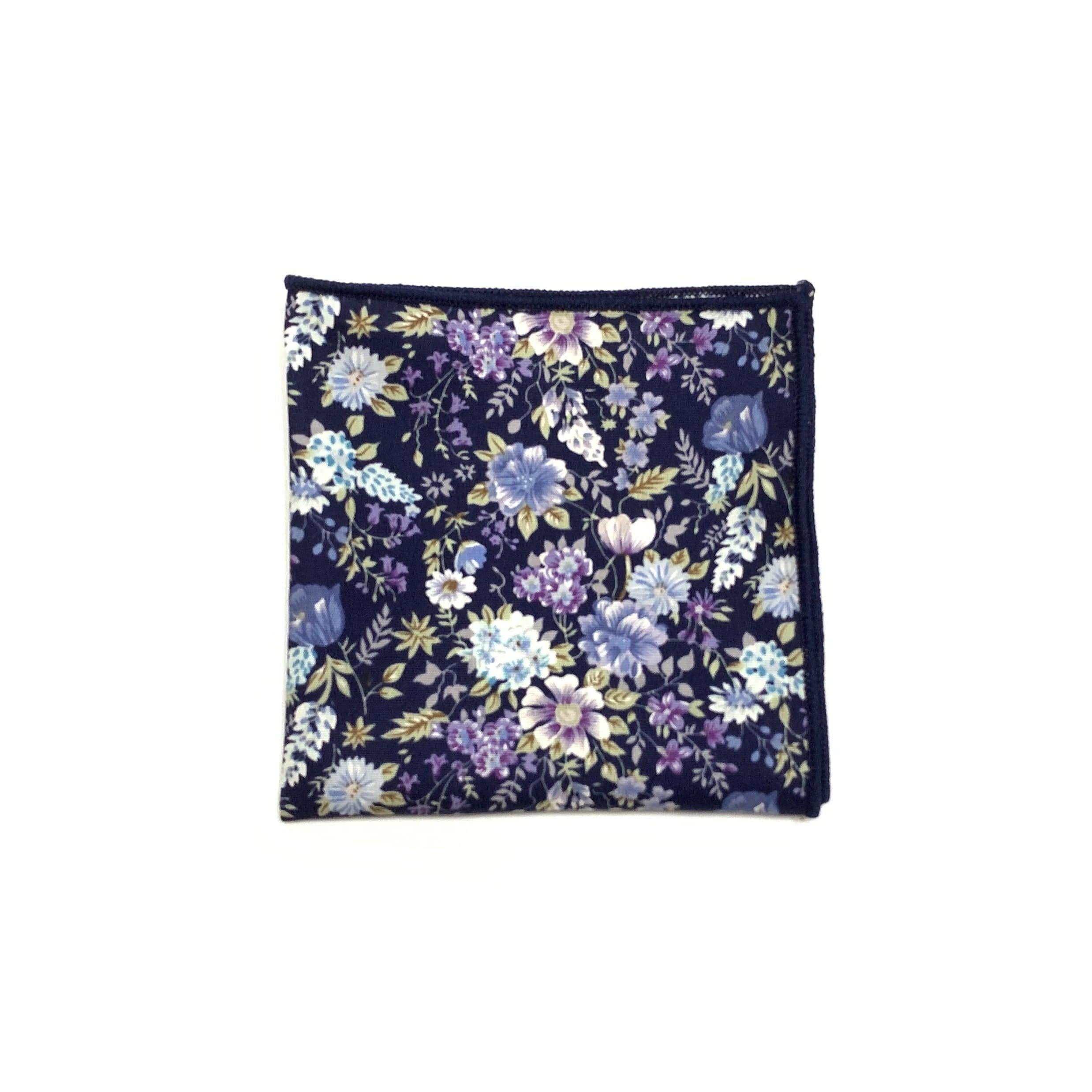 Purple Floral Pocket Square - Sweet Pea - Mytieshop Mytieshop Material CottonItem Length: 23 cm ( 9 inches)Item Width : 22 cm (8.6 inches) Base is Blue Great for: Groom Groomsmen Wedding Shoots Formal Prom Fancy Parties Gifts and presents A dashing addition to any formal outfit. A purple pocket square with a sweet floral design, this piece is perfect for adding a touch of personality to any suit or tuxedo. Class up your look with this dapper accessory. Whether you're wearing it to a wedding or j