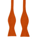 Rust Orange Bow Tie Self Tie SAFFRON MYTIESHOP-Rust Orange Bow Tie 100% Suede Handmade Adjustable to fit most neck sizes 13 3/4" - 18" Make a dapper statement at your next formal event with this rust orange bow tie. Handcrafted from premium suede, this bow tie has a luxurious feel that will have you looking and feeling your best. The perfect accessory for fall weddings, this bow tie will add a touch of sophistication to your outfit. Whether you're the groom or a member of the wedding party, this
