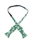 Sage Green Floral Bow Tie Men Self Tie - AUGUST - MYTIESHOP-Floral bow tie men - August floral bow tie - Color: Green 100% Cotton Flannel Handmade Adjustable to fit most neck sizes 13 3/4" - 18" Great for: Weddings Elopements Gift Anniversaries Events This beautiful bow tie is perfect for an elopement or wedding. The sage green and off white flowers on this bow tie make it perfect for a spring or summer wedding. The self tie bow tie makes it easy to adjust and fit to your size. This bow tie woul