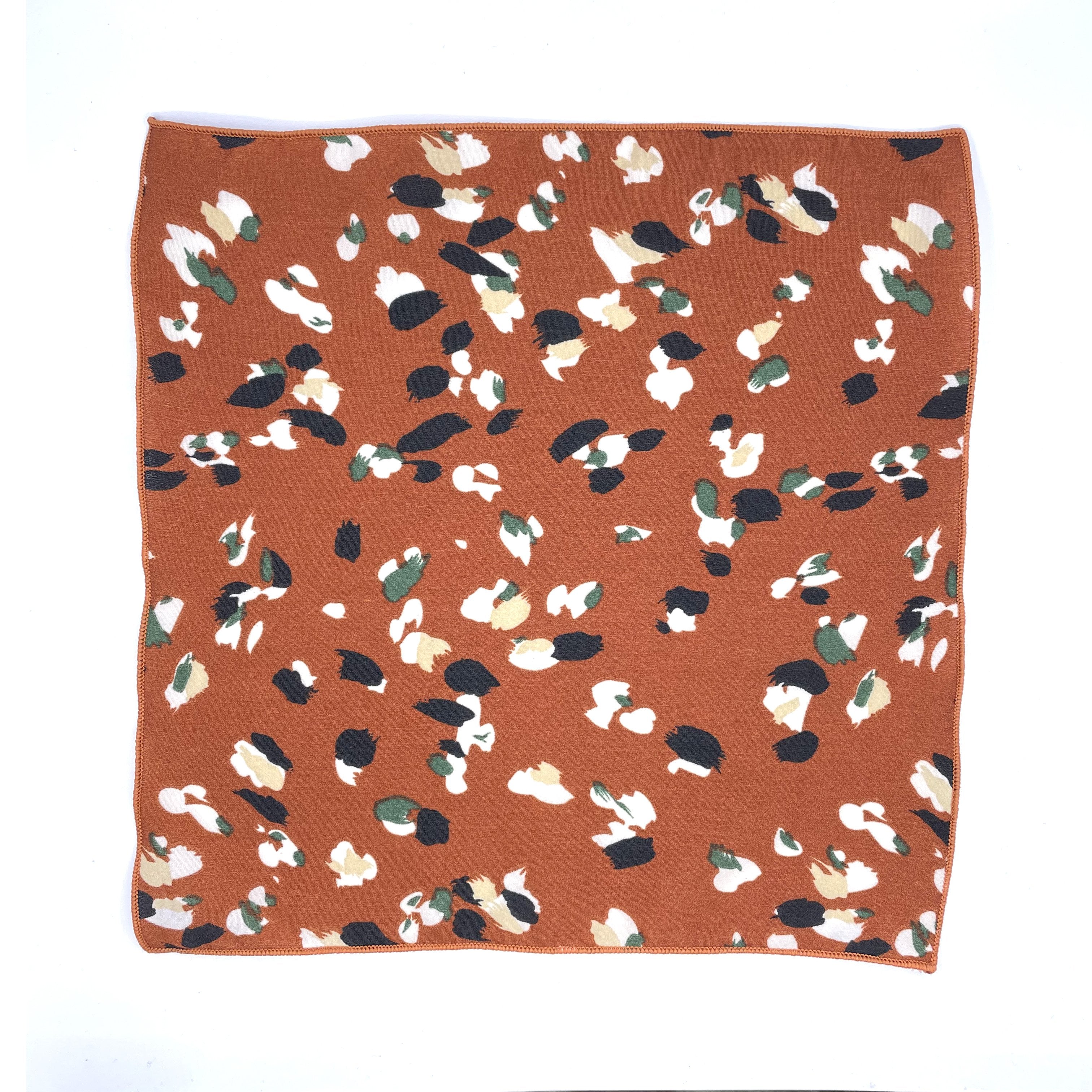Terracotta Floral Pocket Square - Mytieshop - PHOEBE T Mytieshop Terracotta Floral Pocket Square Material CottonItem Length: 23 cm ( 9 inches)Item Width : 22 cm (8.6 inches) Color: Terracotta The PHOEBE is the perfect accessory to add a touch of elegance to your outfit. Made of 100% Silk, this pocket square is sure to make a statement. The intricate floral design is eye-catching and will surely turn heads. Whether you're dressing up for a special occasion or simply want to add a touch of sophist