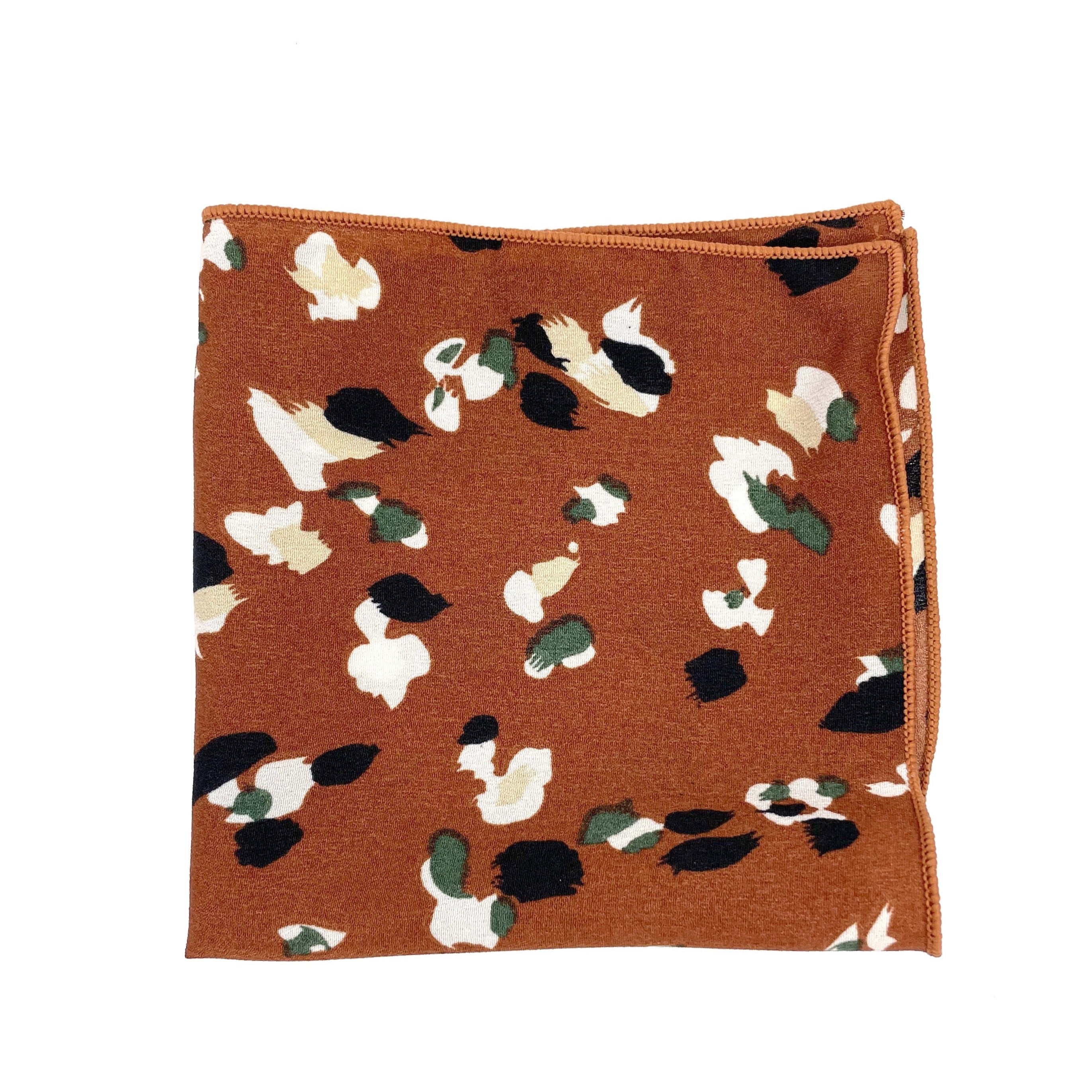 Terracotta Floral Pocket Square - Mytieshop - PHOEBE T Mytieshop Terracotta Floral Pocket Square Material CottonItem Length: 23 cm ( 9 inches)Item Width : 22 cm (8.6 inches) Color: Terracotta The PHOEBE is the perfect accessory to add a touch of elegance to your outfit. Made of 100% Silk, this pocket square is sure to make a statement. The intricate floral design is eye-catching and will surely turn heads. Whether you&#39;re dressing up for a special occasion or simply want to add a touch of sophist
