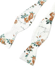 White Floral Bow Tie self tie KENNEDY - MYTIESHOP-White Floral Bow Tie self tie 100% Cotton Flannel Handmade Adjustable to fit most neck sizes 13 3/4" - 18" Color: White Dapper and debonair, this white floral tie with green and copper flowers is perfect for weddings and other special occasions. With a self tie bow tie, you'll be sure to look your best. This dashing floral tie is perfect for all sorts of events, from weddings to formal parties. Whether you're dressing up for a black tie event or 