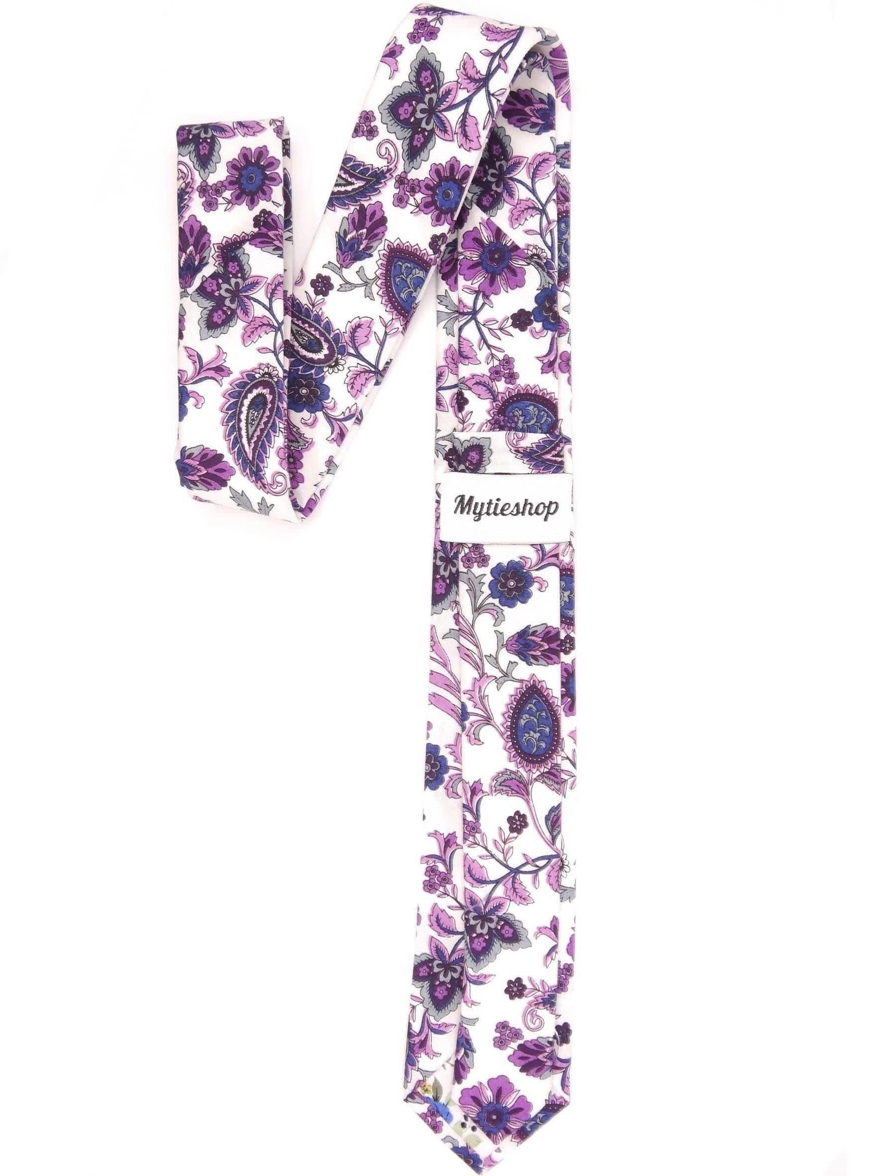White floral print tie 2.36&quot; WINSTON - MYTIESHOP-Neckties-White floral print tie with purple flowers print for wedding groom groomsmen. Neckties for men, prom formals missions floral ties. dope ties designs.-Mytieshop. Skinny ties for weddings anniversaries. Father of bride. Groomsmen. Cool skinny neckties for men. Neckwear for prom, missions and fancy events. Gift ideas for men. Anniversaries ideas. Wedding aesthetics. Flower ties. Dry flower ties.