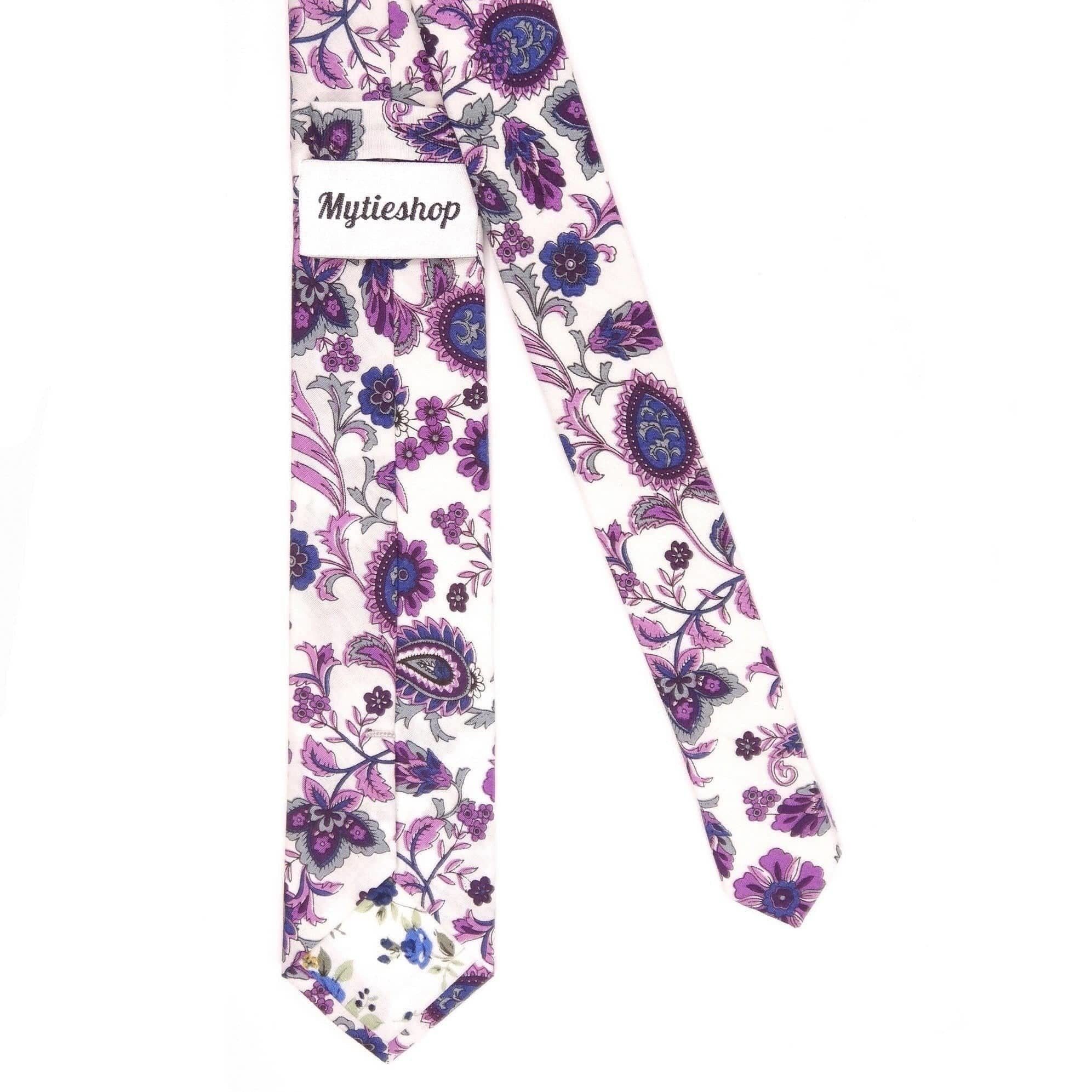 White floral print tie 2.36&quot; WINSTON - MYTIESHOP-Neckties-White floral print tie with purple flowers print for wedding groom groomsmen. Neckties for men, prom formals missions floral ties. dope ties designs.-Mytieshop. Skinny ties for weddings anniversaries. Father of bride. Groomsmen. Cool skinny neckties for men. Neckwear for prom, missions and fancy events. Gift ideas for men. Anniversaries ideas. Wedding aesthetics. Flower ties. Dry flower ties.